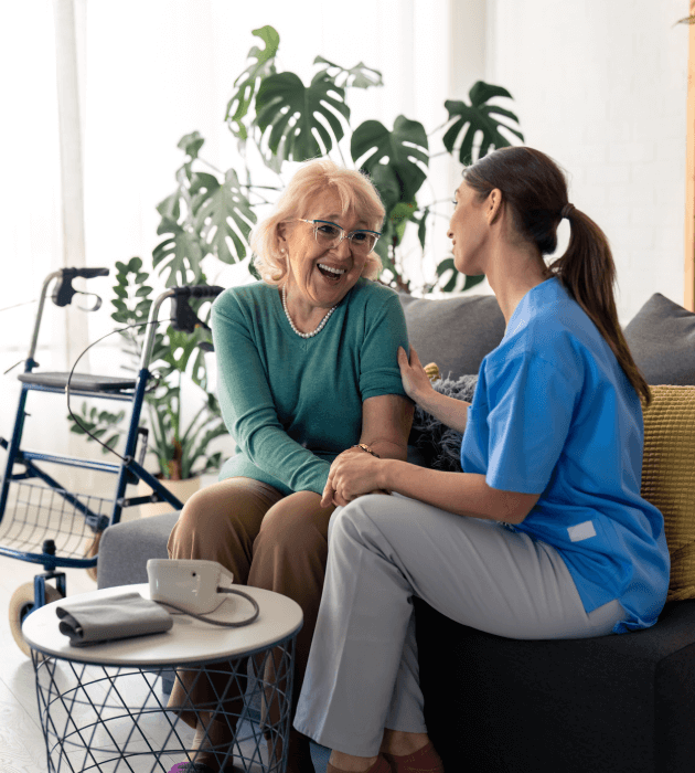 Woman and Nurse sitting on a couch